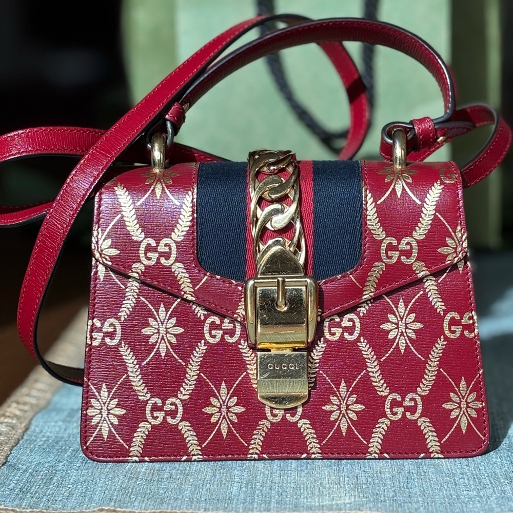 GUCCI
Sylvie Small Printed Leather Satchel Bag Red
